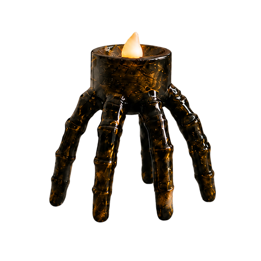 Şeffaf arka planda siyah iskelet el şeklinde Halloween tealight mumluk