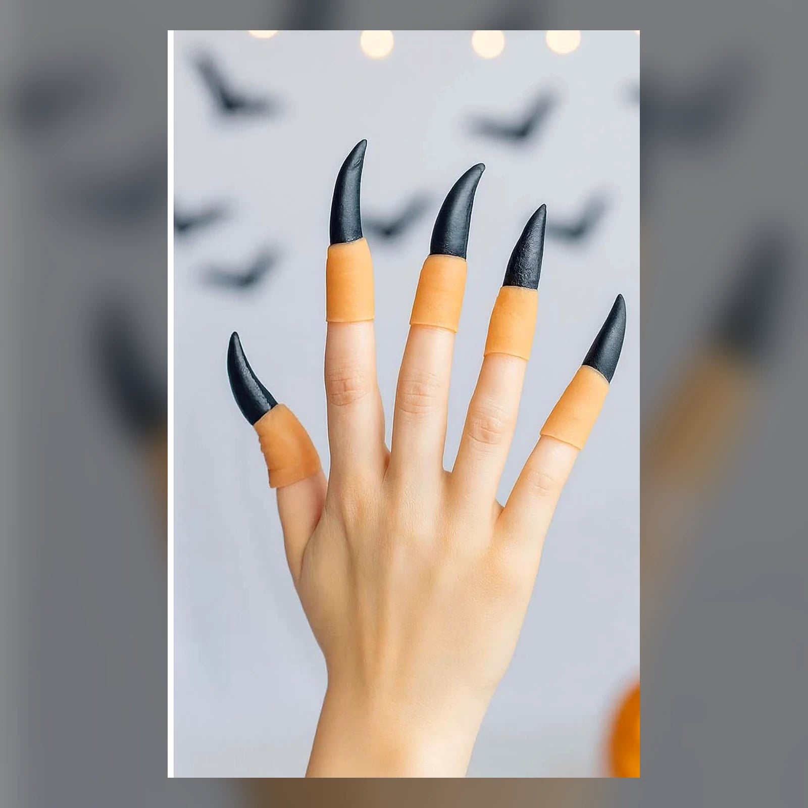 El üzerinde kullanılan siyah uzun sivri cadı tırnakları Halloween aksesuarı
